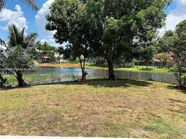 10521 SW 13th Ct, Pembroke Pines, FL 33025 - view of yard with a water view and fence