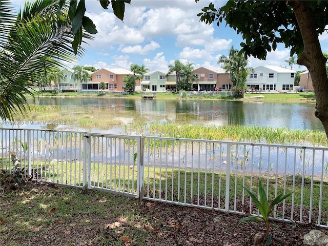 10521 SW 13th Ct, Pembroke Pines, FL 33025 - view of water feature with a residential view and fence
