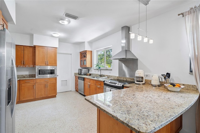 10619 NE 10th Pl, Miami Shores, FL 33138 - kitchen featuring island range hood, stainless steel appliances, a peninsula, and brown cabinets