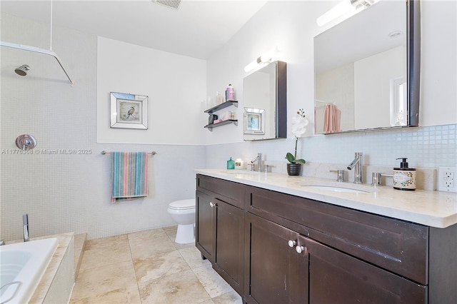 10619 NE 10th Pl, Miami Shores, FL 33138 - bathroom with tile walls, double vanity, a tile shower, tiled tub, and tile patterned floors