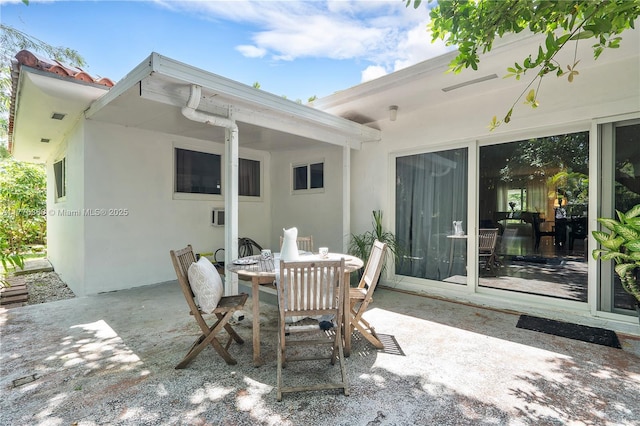10619 NE 10th Pl, Miami Shores, FL 33138 - view of patio with outdoor dining area