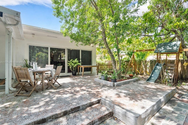 10619 NE 10th Pl, Miami Shores, FL 33138 - view of patio with a playground