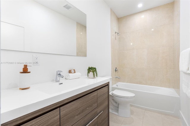 full bathroom featuring vanity, tile patterned flooring, toilet, visible vents, and tub / shower combination