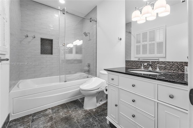 872 NE 79, Boca Raton, FL 33487 - bathroom featuring toilet, vanity, and shower / bath combination with glass door