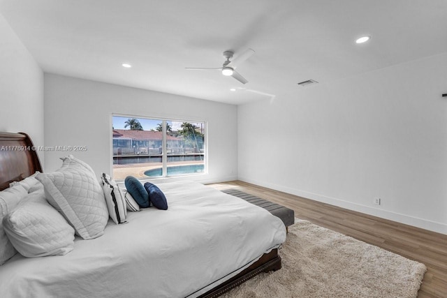872 NE 79, Boca Raton, FL 33487 - bedroom with wood finished floors, recessed lighting, ceiling fan, and baseboards