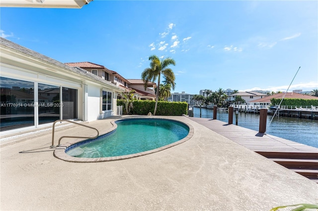 872 NE 79, Boca Raton, FL 33487 - outdoor pool featuring a patio, a boat dock, and a water view