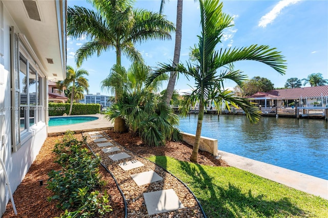 872 NE 79, Boca Raton, FL 33487 - view of yard featuring a water view and an outdoor pool