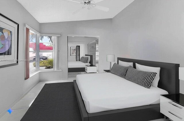 3881 Hidden Cypress Way, Lake Worth, FL 33467 - bedroom featuring vaulted ceiling and baseboards