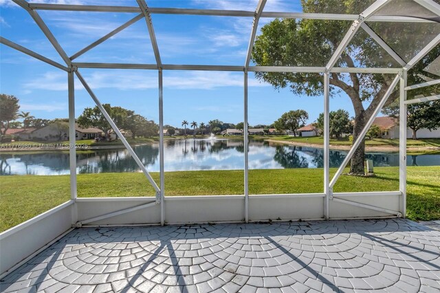 3881 Hidden Cypress Way, Lake Worth, FL 33467 - unfurnished sunroom with a water view