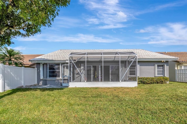 3881 Hidden Cypress Way, Lake Worth, FL 33467 - back of house with a tiled roof, stucco siding, and a lanai