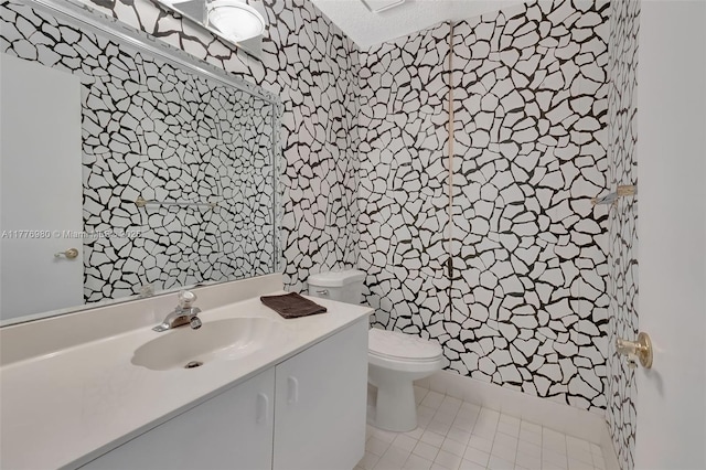 3881 Hidden Cypress Way, Lake Worth, FL 33467 - half bathroom with vanity, wallpapered walls, and a textured ceiling