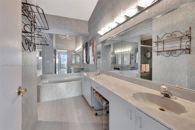 3881 Hidden Cypress Way, Lake Worth, FL 33467 - bathroom with a bath, double vanity, a stall shower, tile patterned floors, and a ceiling fan