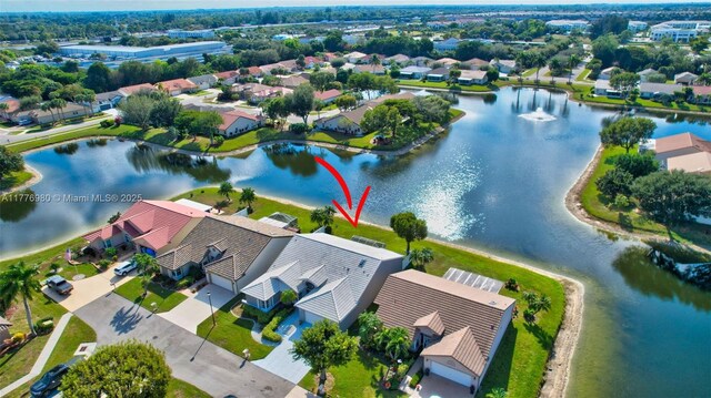 3881 Hidden Cypress Way, Lake Worth, FL 33467 - aerial view of residential area with a nearby body of water