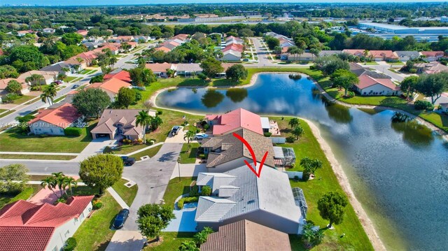 3881 Hidden Cypress Way, Lake Worth, FL 33467 - aerial perspective of suburban area with a large body of water