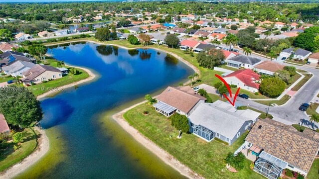 3881 Hidden Cypress Way, Lake Worth, FL 33467 - aerial view of residential area with a nearby body of water