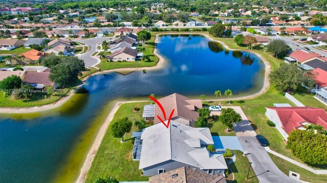 3881 Hidden Cypress Way, Lake Worth, FL 33467 - aerial view of residential area featuring a nearby body of water