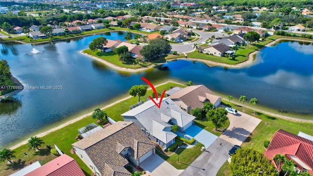 3881 Hidden Cypress Way, Lake Worth, FL 33467 - aerial view of residential area with a nearby body of water