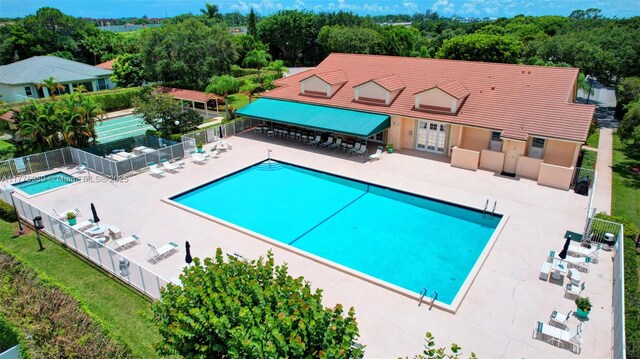 3881 Hidden Cypress Way, Lake Worth, FL 33467 - community pool featuring french doors and a patio area