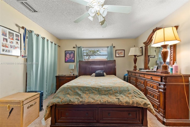6034 Indrio Rd Unit 7, Fort Pierce, FL 34951 - carpeted bedroom with a textured ceiling, ceiling fan, and visible vents