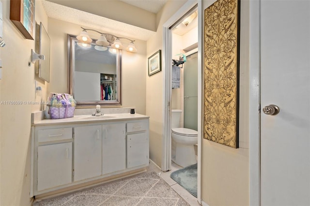 6034 Indrio Rd Unit 7, Fort Pierce, FL 34951 - bathroom featuring toilet, vanity, tile patterned flooring, and a shower