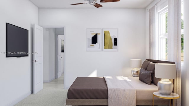 bedroom featuring carpet flooring and baseboards