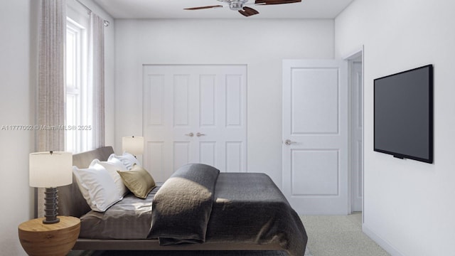 bedroom featuring a closet, ceiling fan, baseboards, and carpet