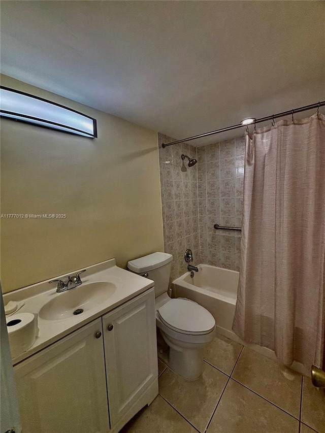 bathroom with tile patterned floors, toilet, shower / tub combo with curtain, and vanity