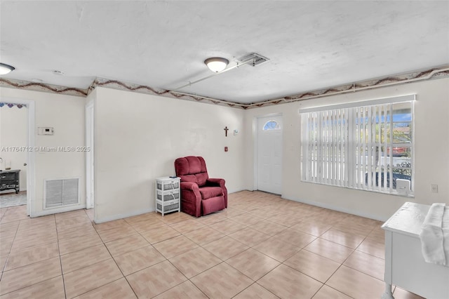 1910 NE 56th St, Fort Lauderdale, FL 33308 - sitting room featuring light tile patterned floors