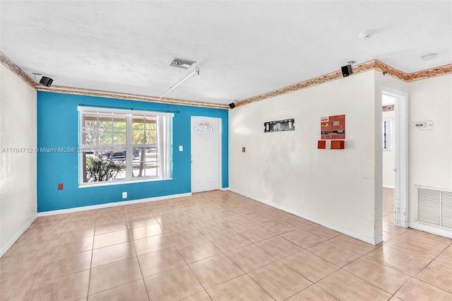 1910 NE 56th St, Fort Lauderdale, FL 33308 - tiled spare room with baseboards