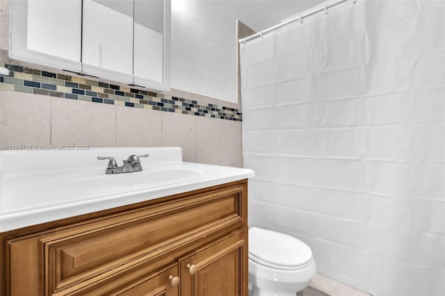1910 NE 56th St, Fort Lauderdale, FL 33308 - bathroom featuring tile walls, toilet, vanity, and a shower with shower curtain