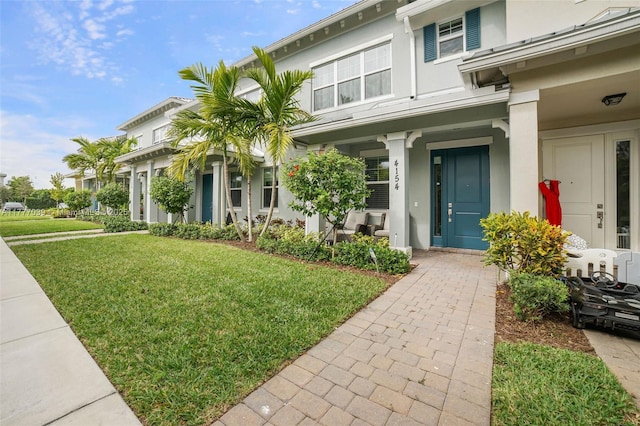 4154 Greenway Dr, Hollywood, FL 33021 - view of front of house featuring a front yard and stucco siding