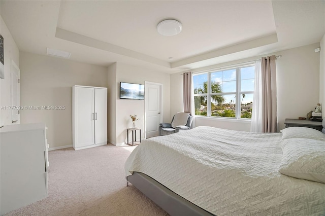 4154 Greenway Dr, Hollywood, FL 33021 - bedroom with a raised ceiling, baseboards, and light colored carpet