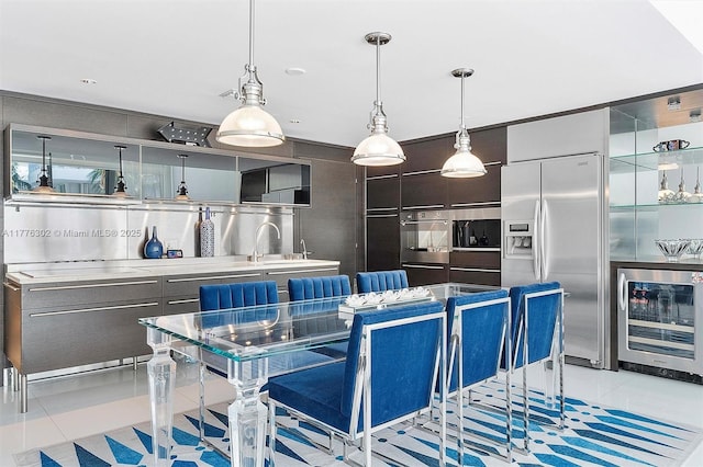 interior space with beverage cooler and light tile patterned floors