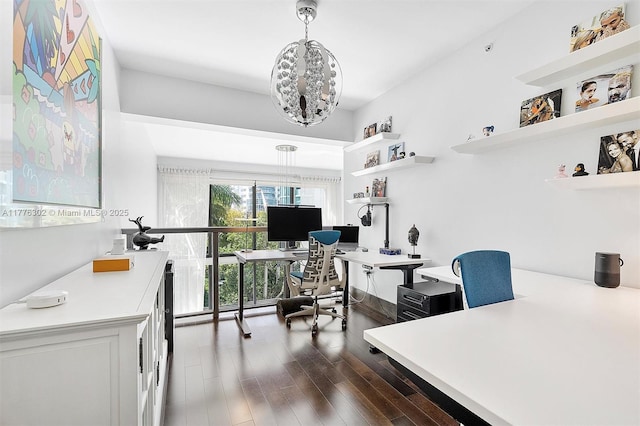 office area with an inviting chandelier and dark wood-style flooring