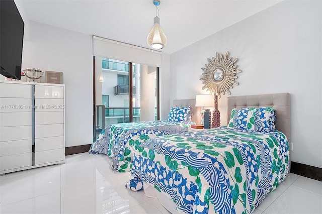 tiled bedroom with baseboards and cooling unit