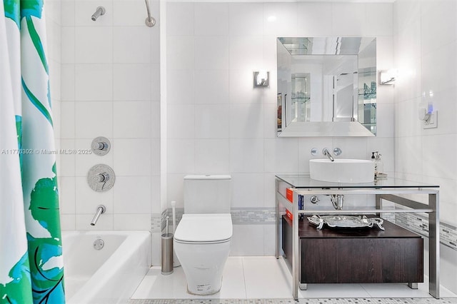 full bath featuring vanity, shower / bath combination with curtain, toilet, and tile walls