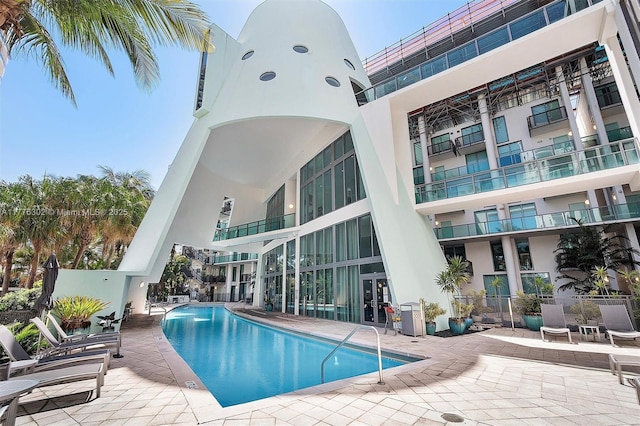pool featuring a patio area