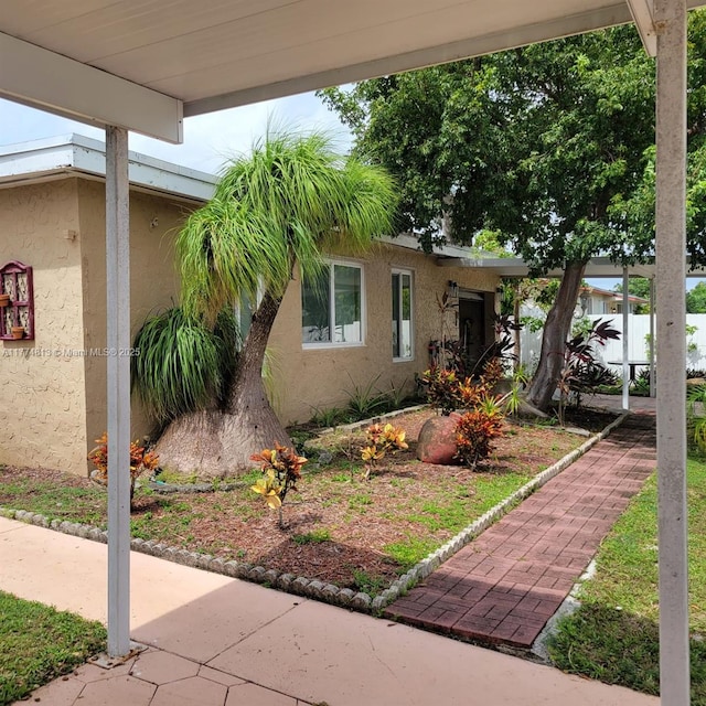 view of front of property featuring stucco siding