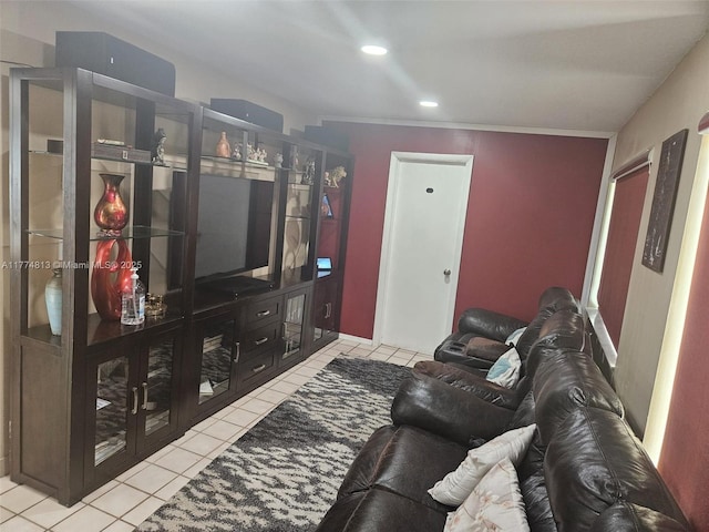 living area featuring light tile patterned floors and recessed lighting