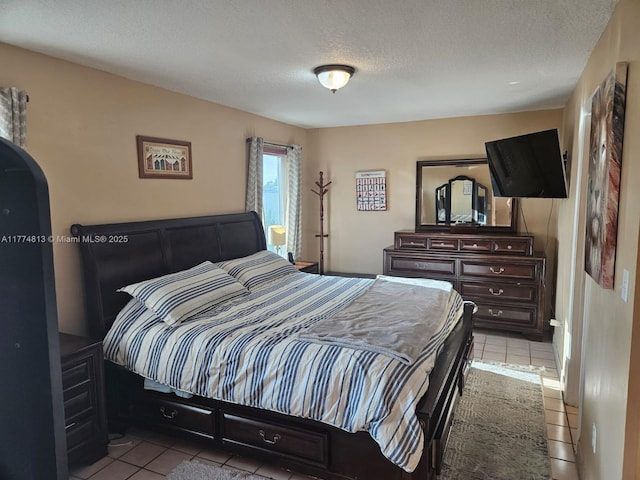 tiled bedroom with a textured ceiling