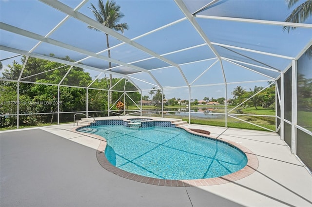 9145 Picot Ct, Boynton Beach, FL 33472 - view of swimming pool with a patio area, a pool with connected hot tub, a water view, and a lanai