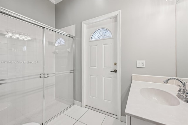 9145 Picot Ct, Boynton Beach, FL 33472 - bathroom with a stall shower, tile patterned floors, and vanity