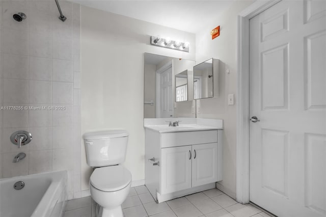 full bathroom with shower / bathing tub combination, vanity, toilet, baseboards, and tile patterned floors