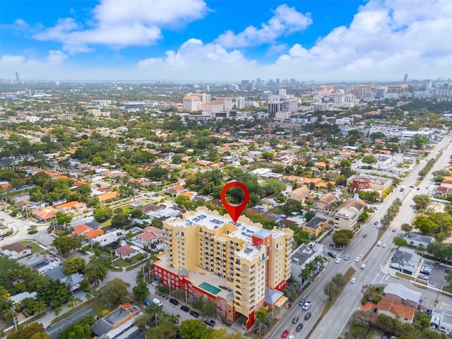 birds eye view of property featuring a city view