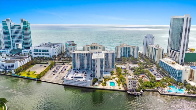 bird's eye view featuring a city view and a water view