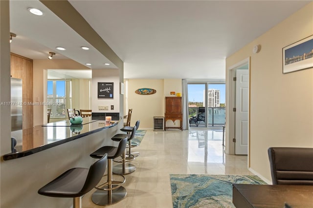 dining space with visible vents, baseboards, and an inviting chandelier