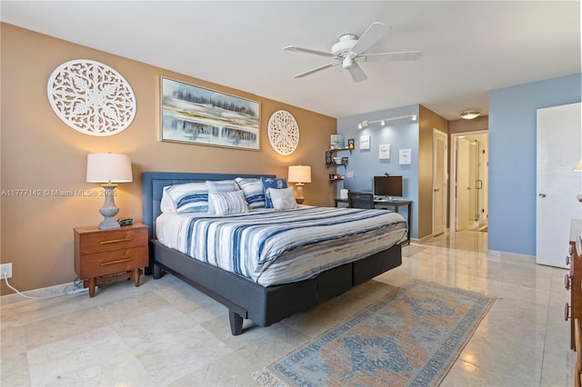 bedroom featuring baseboards, marble finish floor, and a ceiling fan