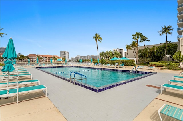 community pool featuring a patio area