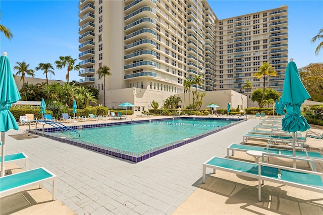 community pool featuring a patio area