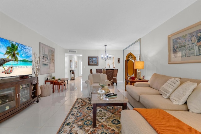 14773 Cumberland Dr Unit 208, Delray Beach, FL 33446 - living room with a chandelier and light tile patterned floors